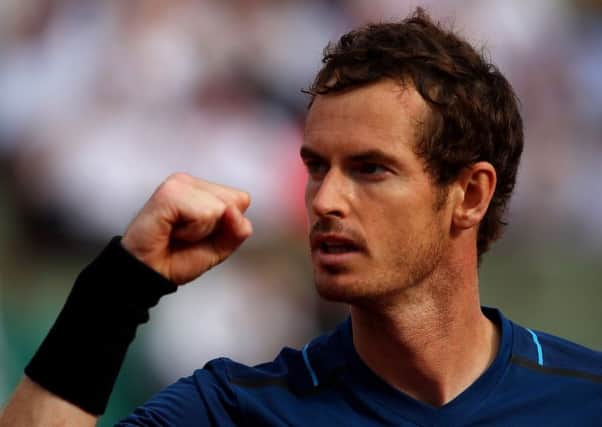Andy Murray celebrates winning a point during the first round match against Andrey Kuznetsov. Picture: Getty