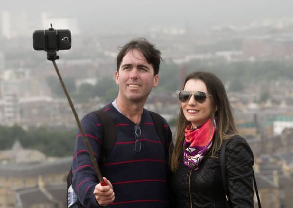 The BounceIt app lets users see how widely their images have been shared around the world. Picture: Steven Scott Taylor
