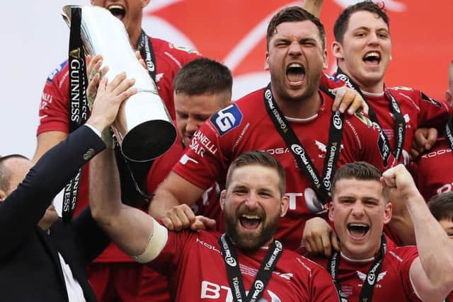 John Barclay celebrates with team-mates after Scarlets' victory over Munster in the  Guinness Pro12 final in Dublin.