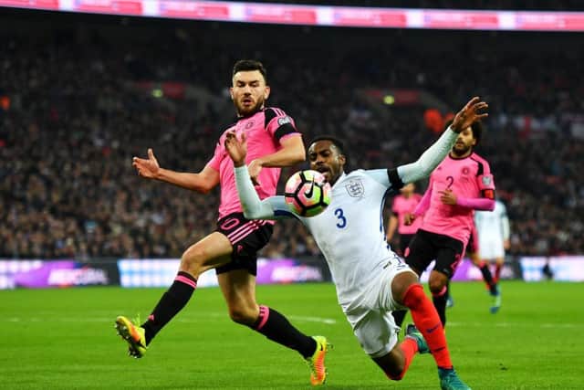 Scotland's Robert Snodgrass and Danny Rose of England during the  World Cup qualifier at Wembley in November. Picture: Mike Hewitt/Getty Images