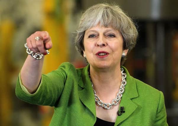 Theresa May speaks during a question and answer session during a general election campaign rally. Picture: AFP/Getty Images
