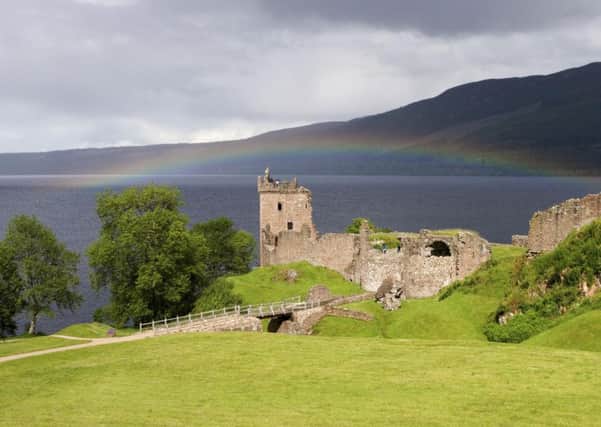 Uquhart Castle and Loch Ness. Picture: PA