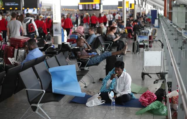 Some of the 75,000 passengers hit by the BA disruption slept in airport terminals. Picture: AFP/Getty Images
