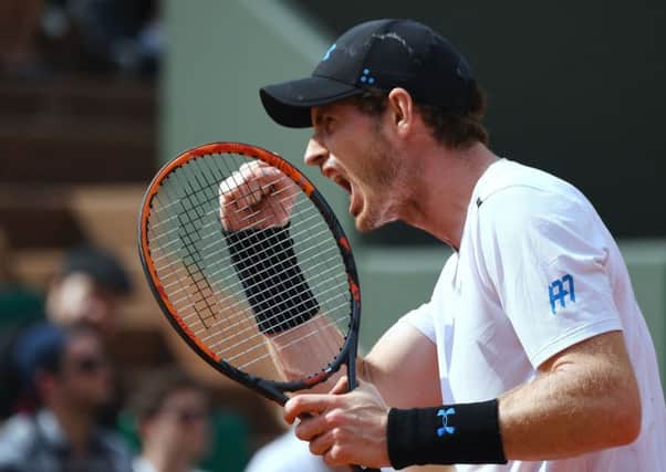 Andy Murray celebrates a point against Slovakia's Martin Klizan at Roland Garros. Picture: AFP/Getty Images