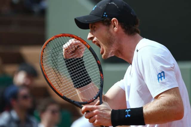 Andy Murray celebrates a point against Slovakia's Martin Klizan at Roland Garros. Picture: AFP/Getty Images