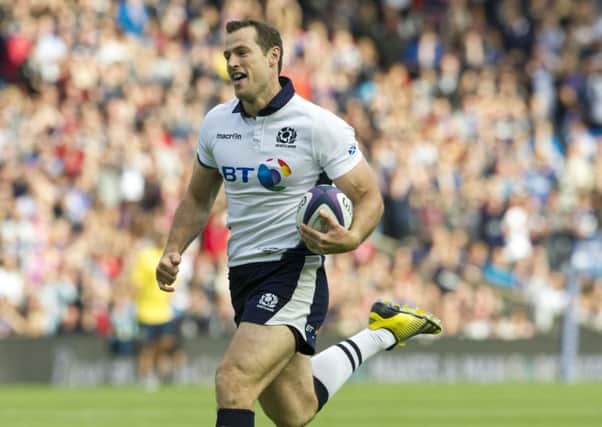 Tim Visser heads for the line to score a second try against Italy in 2015.
Photograph: Ian Rutherford