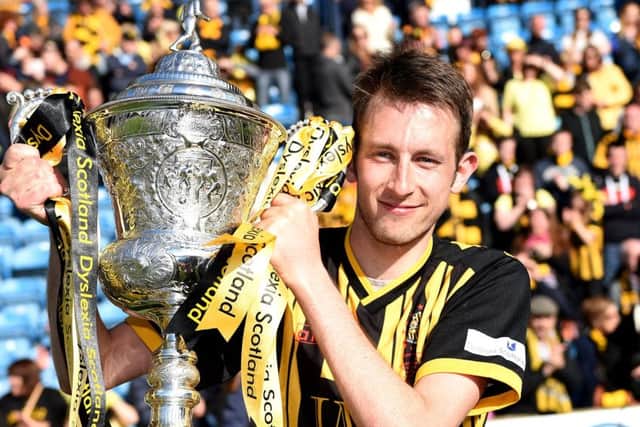 Dwayne Hislop celebrates Auchinlecks victory over Musselburgh in the 2015 final. Photograph: Craig Williamson/SNS