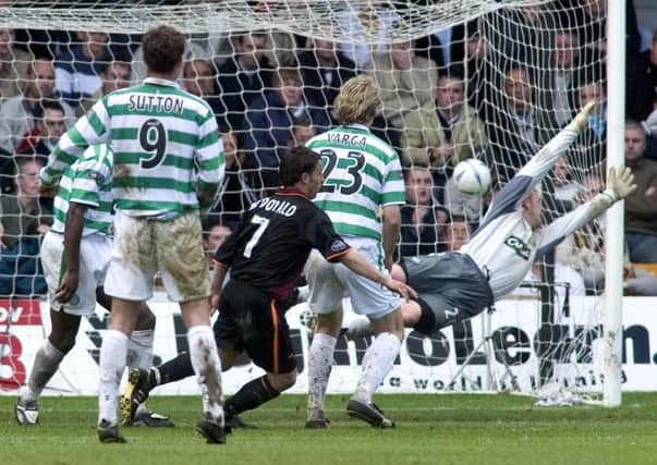 Scott McDonald equalises for Motherwell as the championship slips away from Celtic in 2005. Picture: SNS