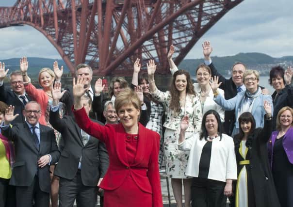 Nicola Sturgeon celebrates her 2015 landslide with SNP MPs at South Queensferry in front of the Forth Bridge. Picture: Jane Barlow