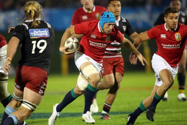 British & Irish Lions' Justin Tipuric charges foward with the ball during the rugby match against New Zealand's Provincial Barbarians. Pic: MICHAEL BRADLEY/AFP/Getty Images