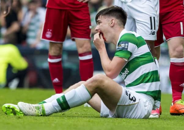 Celtic's Kieran Tierney nurses his mouth after the cup final incident. Picture: Alan Harvey/SNS
