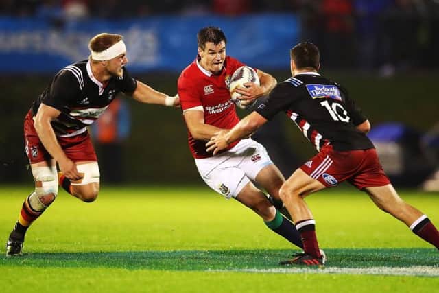 Lions No 10 Johnny Sexton finds his way blocked by two defenders and he was replaced after a disappointing 48 minutes. Picture: Hannah Peters/Getty Images