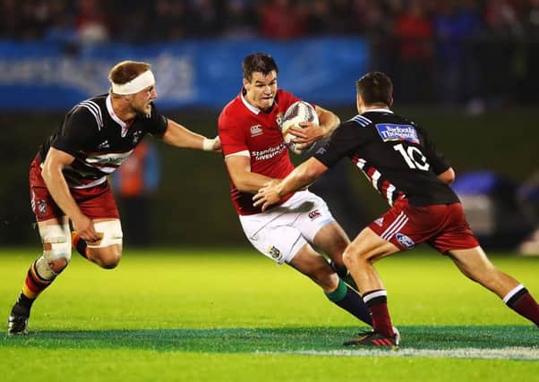 Lions No 10 Johnny Sexton finds his way blocked by two defenders and he was replaced after a disappointing 48 minutes. Picture: Hannah Peters/Getty Images