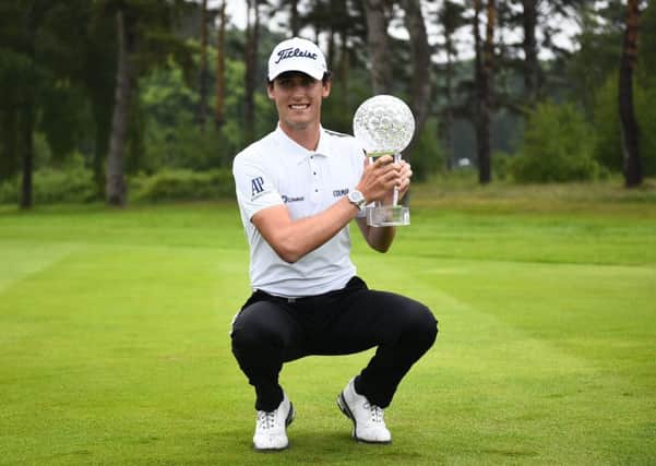 Italy's Renato Paratore poses with the trophy after winning the Nordea Masters at Barseback Golf Club, Sweden. Picture: AP