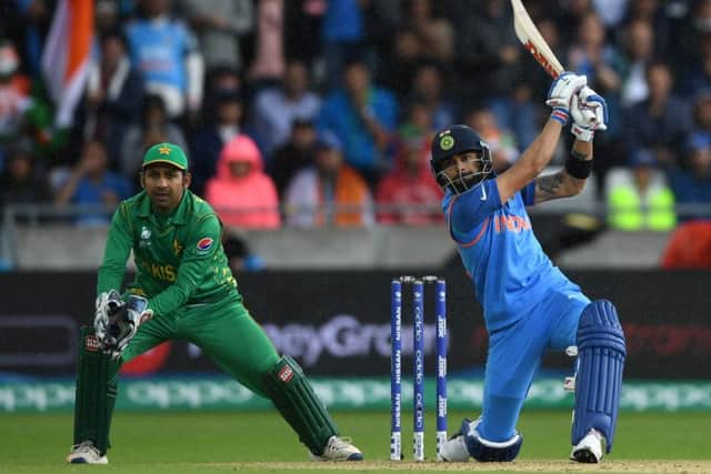 Virat Kohli hits out on his way to an unbeaten 81 in India's Champions Trophy win over Pakistan at Edgbaston. Picture: Gareth Copley/Getty Images