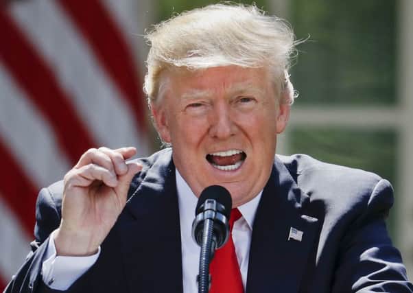 President Donald Trump has pulled the US out of the Paris climate change accord. Picture: Pablo Martinez Monsivais/AP