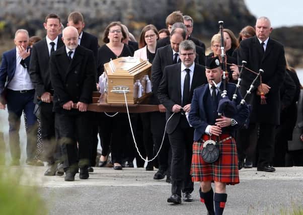 Roddy MacLeod father of Manchester bomb victim Eilidh MacLeod leads the funeral procession on its way to the Church of Our Lady, Star of the Sea, in Castlebay. Picture: PA