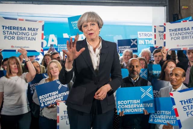 Prime Minister Theresa May visits Clockwork Removal and Storage company in Edinburgh in the build up to the UK general election. Picture: Ian Georgeson