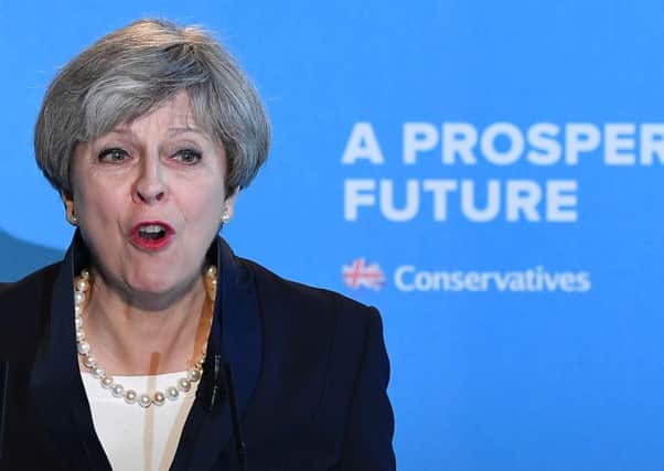 Theresa May commands trust and respect, says John Maguire. Picture: Getty Images