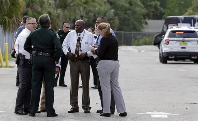 Police in attendance at shooting in Orlando which left five dead. Picture: AP Photo/John Raoux