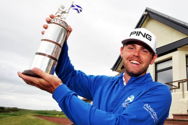 Liam Johnston with the Carrick Neill Scottish Men's Open trophy.