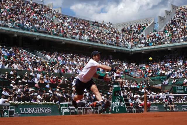 Andy Murray hits a return to Karen Khachanov during his fourth-round win over the Russian at Roland Garros. Picture: Olivier Morin/AFP/Getty Images