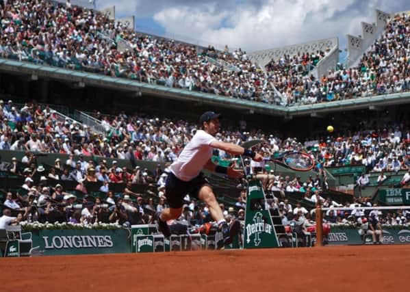Andy Murray hits a return to Karen Khachanov during his fourth-round win over the Russian at Roland Garros. Picture: Olivier Morin/AFP/Getty Images