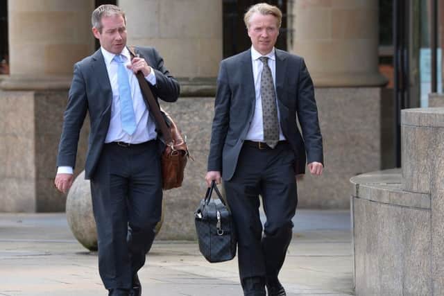 Lawyer Paul Kavanagh (left) and Craig Whyte (right) leaving Glasgow High Court as the  jury in former Rangers owner fraud trial have been told to keep "cool heads" as they prepare to consider their verdict. Picture: Mark Runnacles/PA Wire