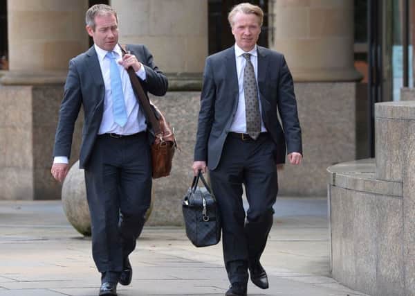 Lawyer Paul Kavanagh (left) and Craig Whyte (right) leaving Glasgow High Court as the  jury in former Rangers owner fraud trial have been told to keep "cool heads" as they prepare to consider their verdict. Picture: Mark Runnacles/PA Wire