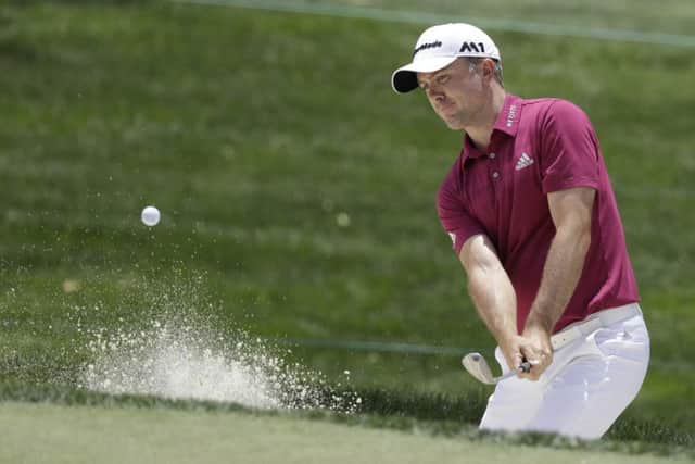 Martin Laird hits out of a bunker during the third round of the Memorial tournament in Ohio at the weekend. Picture: Darron Cummings/AP