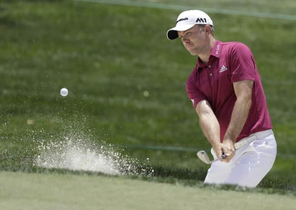 Martin Laird hits out of a bunker during the third round of the Memorial tournament in Ohio at the weekend. Picture: Darron Cummings/AP