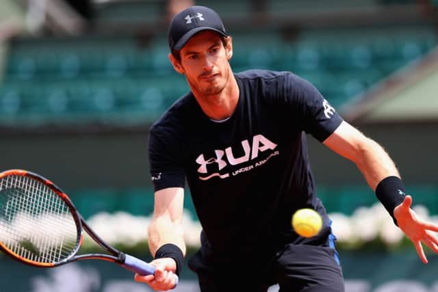 Andy Murray practises on Court Philippe Chatrie rahead of his quarter-final match against Kei Nishikori of Japan.