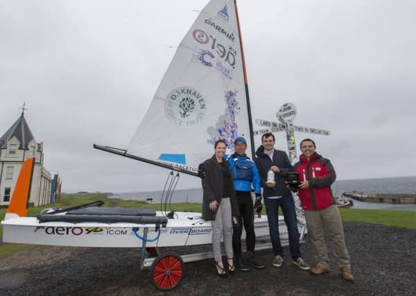 Ken Fowler with MSP Gail Fowler, Sail Scotland chief executive Daniel Steel and Rock Rose Gin managing director Martin Murray, at John O'Groats. Picture: Robert Macdonald/Contributed