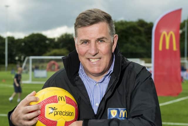 Mark McGhee is glad Wayne Rooney is not in the England squad