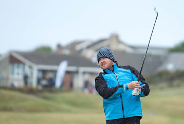 Paul O'Hara tees off at the second in the Northern Open at Moray Golf Club in Lossiemouth. Picture: Kenny Smith