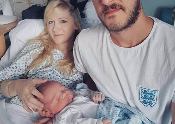 Charlie Gard with his parents Connie Yates and Chris Gard.
Picture: Handout