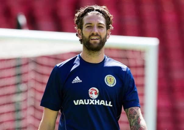 Scotland's Charlie Mulgrew will draw inspiration from Celtic's famous win over Barcelona. Picture: Kirk O'Rourke/PA Wire