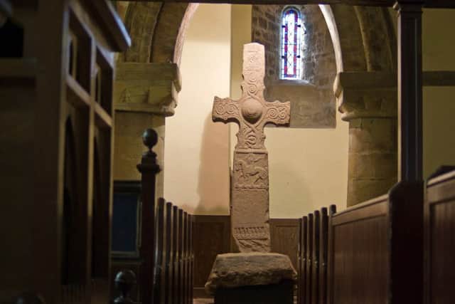 The ancient Dupplin Cross inside St Serf's Kirk. Picture: Simon Warren/Dunning Parish Historical Society