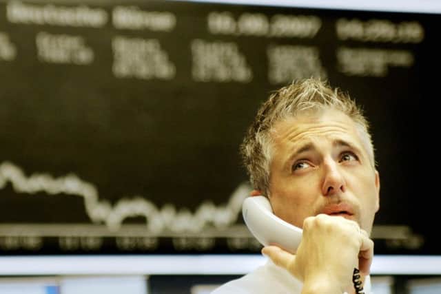CMC Markets said clients were dealing less frequently, but betting more when they were active. Picture: Martin Oeser/AFP/Getty Images