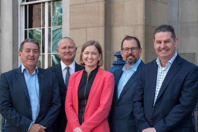 Graeme Buchanan, VP Development, Paul Charmatz, MD, Global Sales, Alex Ford, VP Operations, Wayne Johnson, CEO and Roger Carson, CoFounder