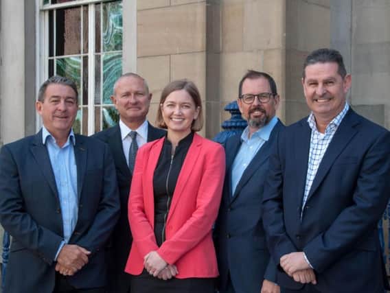 Graeme Buchanan, VP Development, Paul Charmatz, MD, Global Sales, Alex Ford, VP Operations, Wayne Johnson, CEO and Roger Carson, CoFounder