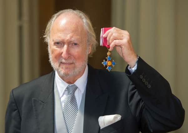 Ed Victor with his Commander of the Order of the British Empire meda. Picture: PA
