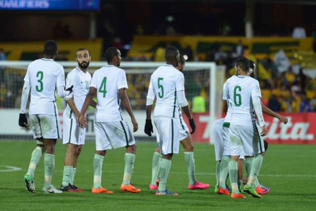 Saudi Arabia's players ignored the minute's silence held in honour of the two Australians murdered in terrorist attack. Picture: BRENTON EDWARDS/AFP/Getty Images