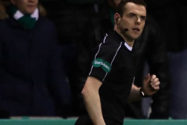 Douglas Ross in action as a referee.