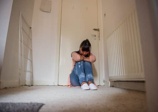 23/06/16 . GLASGOW. Stock shots of distresses woman , frightened woman , mental health , scared , domestic violence , violence towards woman, female, emotion , scared , anger, lone woman, fear.