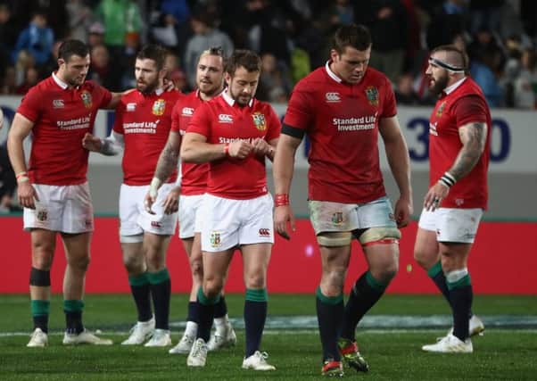 Lions players look dejected after their defeat by the Auckland Blues. Picture: David Rogers/Getty Images