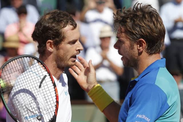 Switzerland's Stan Wawrinka, right, with Andy Murray after their semi-final at Roland Garros. Picture: Michel Euler/AP