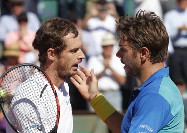 Switzerland's Stan Wawrinka, right, with Andy Murray after their semi-final at Roland Garros. Picture: Michel Euler/AP