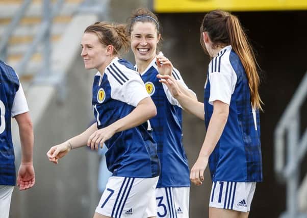 Jane Ross (centre) celebrates scoring Scotland's second goal against Romania. Picture: Roddy Scott/SNS