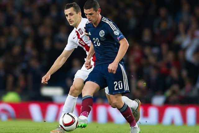 Graham Dorrans in action for Scotland.